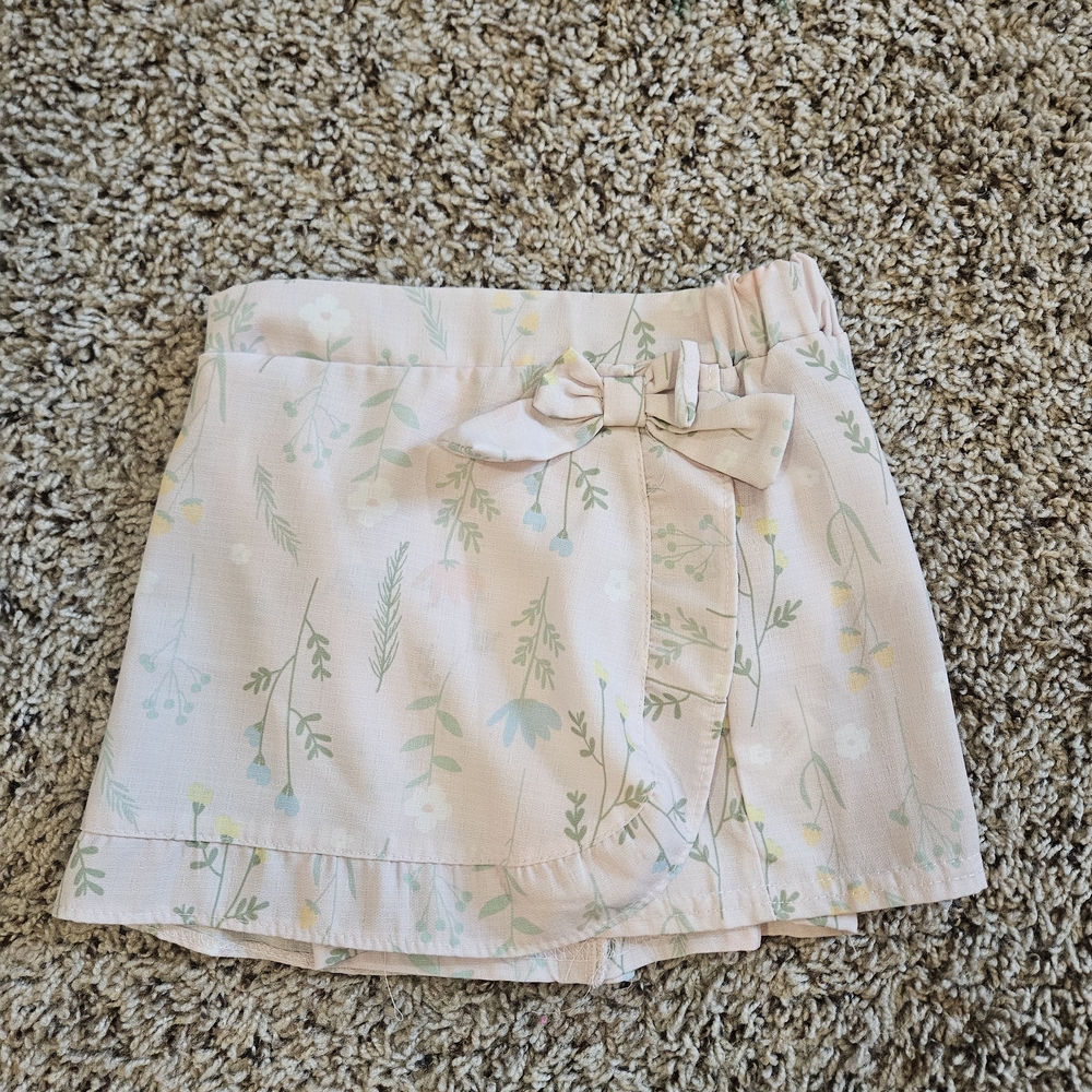 Light Pink Floral Mini Skirt with Bow Accent